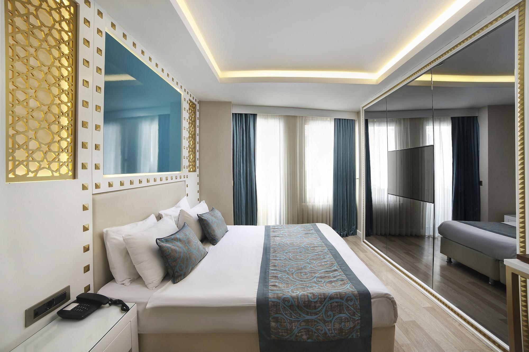 그레이트 포춘 호텔&스파 이스탄불 외부 사진 A bedroom at the hotel