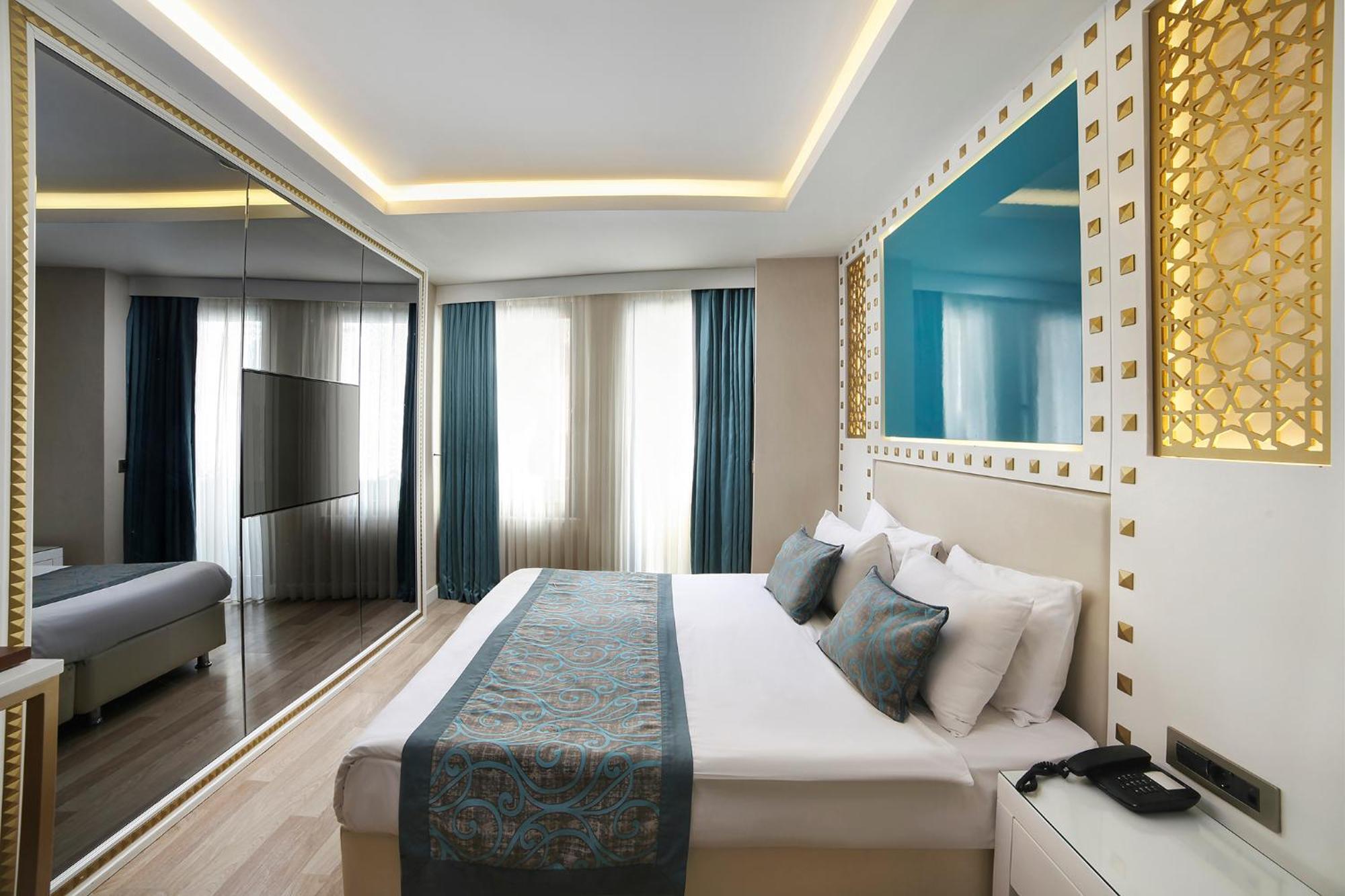 그레이트 포춘 호텔&스파 이스탄불 외부 사진 A bedroom at the hotel